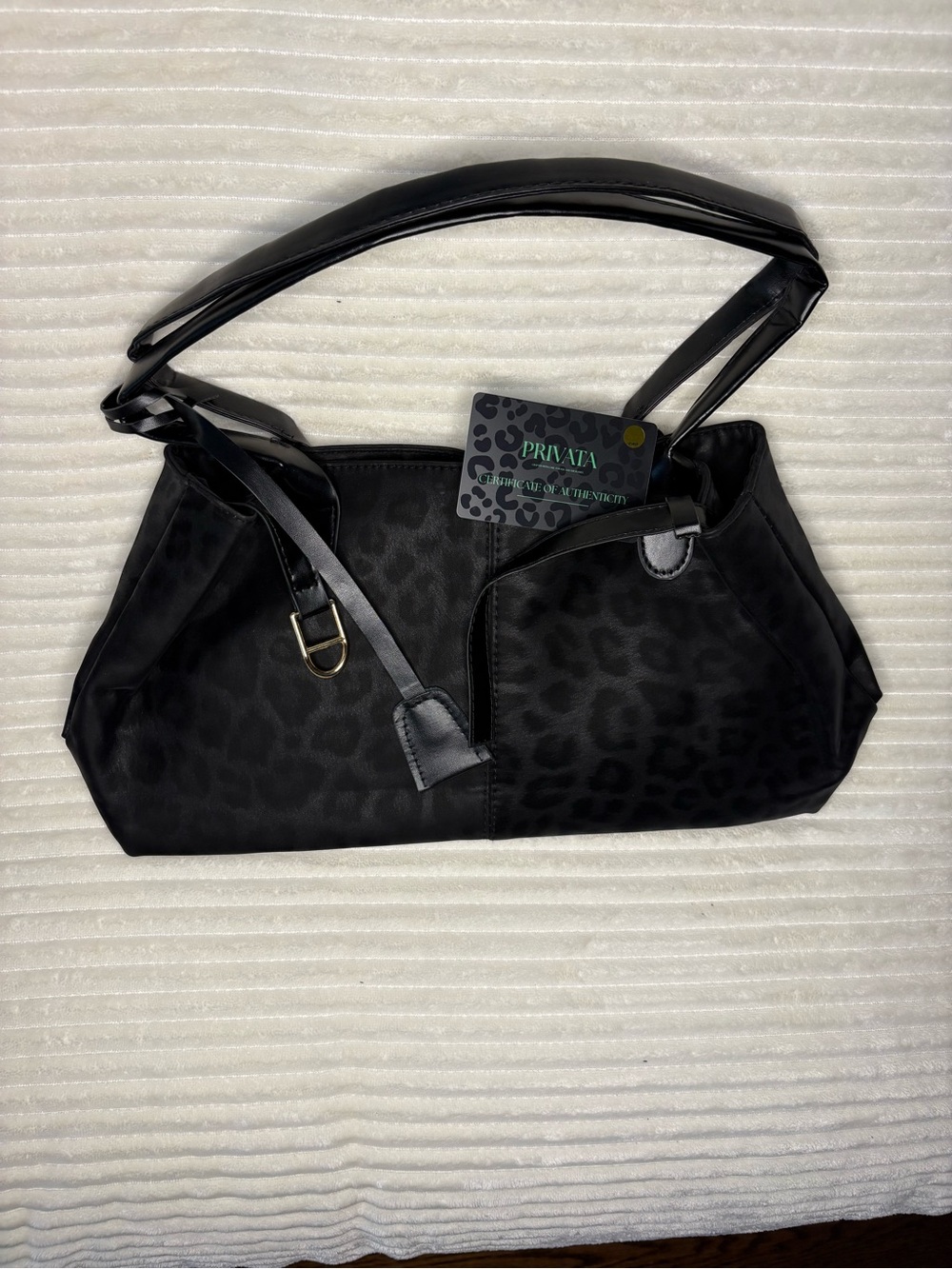 Privata’s Black Leopard-Texture Shoulder Bag